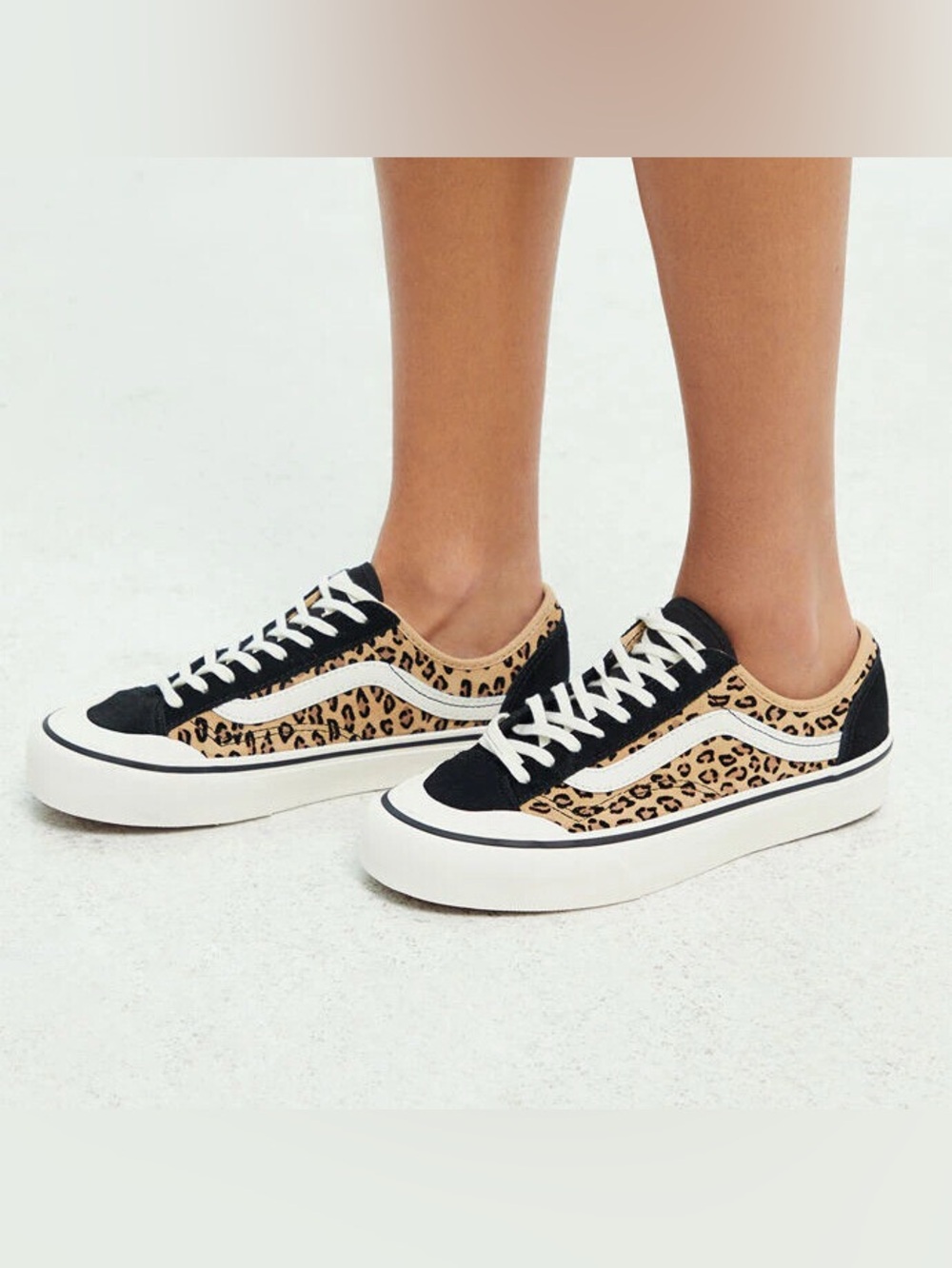 Vans Low-Top Sneakers in Black and Tan Leopard Print